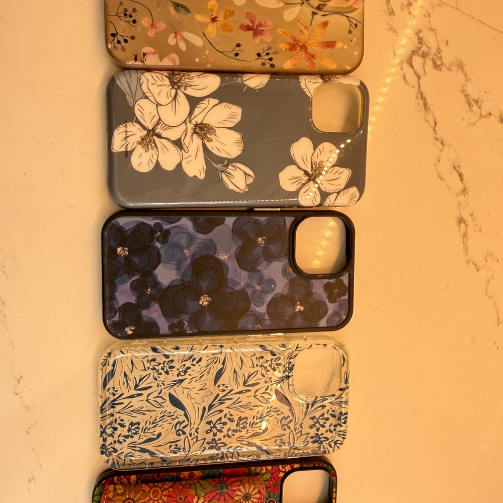 Five cute iPhone 15 floral  cases.